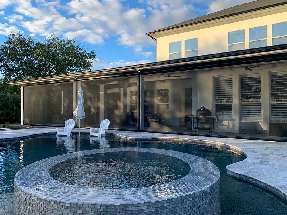 magnatract-motorized-retractable-screens-poolside